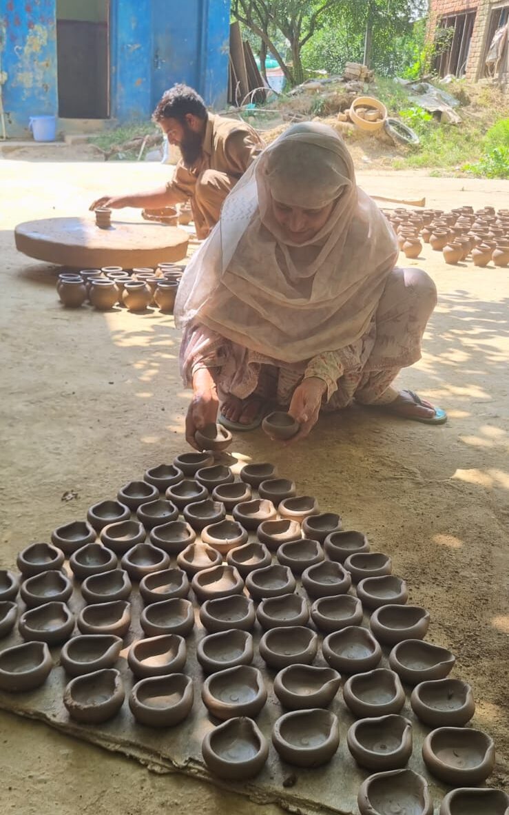 SHG Members Illuminate Festive Spirit with Handcrafted Diyas & Kalashs in 'Meri Mati Mera Desh' Initiative