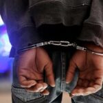 Police arrest key suspect for money laundering & stealing official secrets