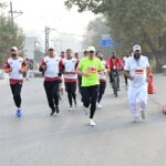 SRINAGAR, NOVEMBER 2: Chief Minister Omar Abdullah today flagged off the second edition of the Kashmir Marathon from Polo View, Srinagar, marking a vibrant celebration of fitness, resilience and the indomitable spirit of Jammu and Kashmir. The race began at 6:00 AM from Polo View, with runners traversing the scenic Boulevard Road along the banks of the Dal Lake. The marathon was organised by the Department of Tourism, Kashmir, featuring multiple categories including the Full Marathon (42 km), Half Marathon (21 km), and shorter runs for amateurs and local participants. This year’s edition saw over 1,100 runners from 27 States and Union Territories of India, along with 77 foreign participants from 11 countries, underscoring Kashmir’s emergence as a premier destination for sports and adventure tourism. The Chief Minister was joined at the flag-off ceremony by Minister for Youth Affairs & Sports Satish Sharma, Advisor to the Chief Minister Nasir Aslam Wani, Bollywood actor Sunil Shetty, MLA Zadibal Tanveer Sadiq, Chief Secretary Atal Dulloo, Additional Chief Secretary to the CM Dheeraj Gupta, ACS Tourism Ashish Verma, Director Tourism Kashmir Raja Yaqoob and other senior civil and police officers. The dignitaries, along with enthusiastic locals, cheered the runners as they set off on their route through the heart of Srinagar. In a display of personal commitment to fitness and public engagement, Chief Minister Omar Abdullah also participated in the Half Marathon and successfully completed the 21-kilometre run in just over one hour and fifty minutes. Later, sharing his experience on X (formerly Twitter), the Chief Minister posted: “Just completed the Kashmir Half Marathon. I didn’t set a personal best but I did improve on my effort last year. Congratulations to all the runners who completed the full marathon & the half marathon. Well done.” It may be recalled that during the first edition of the Kashmir Marathon held on October 20 last year, the Chief Minister had also flagged off and completed the half marathon event. Speaking at the event, Bollywood actor Sunil Shetty said, “People are running for Kashmir and for India. It’s beautiful to witness the excitement among people of all ages. I am delighted to be here and will try to return every year to encourage greater participation.” Expressing gratitude, Minister for Youth Affairs & Sports Satish Sharma said: “This marathon spreads the message of peace, love, prosperity, and brotherhood. Participants, including runners from different countries, are part of this celebration of unity and endurance. I thank Chief Minister Omar Abdullah, actor Sunil Shetty, and everyone who contributed to making this event a success.”